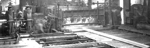 Drawing rail from furnace - Detail of roll stands and hot rail