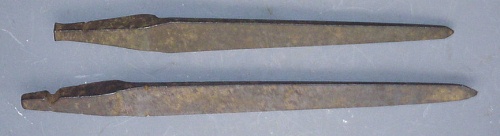 A pair ofsemi-circular tapered reamers; unmarked