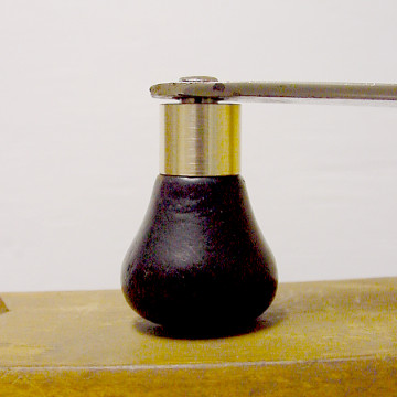 Knob peened in place